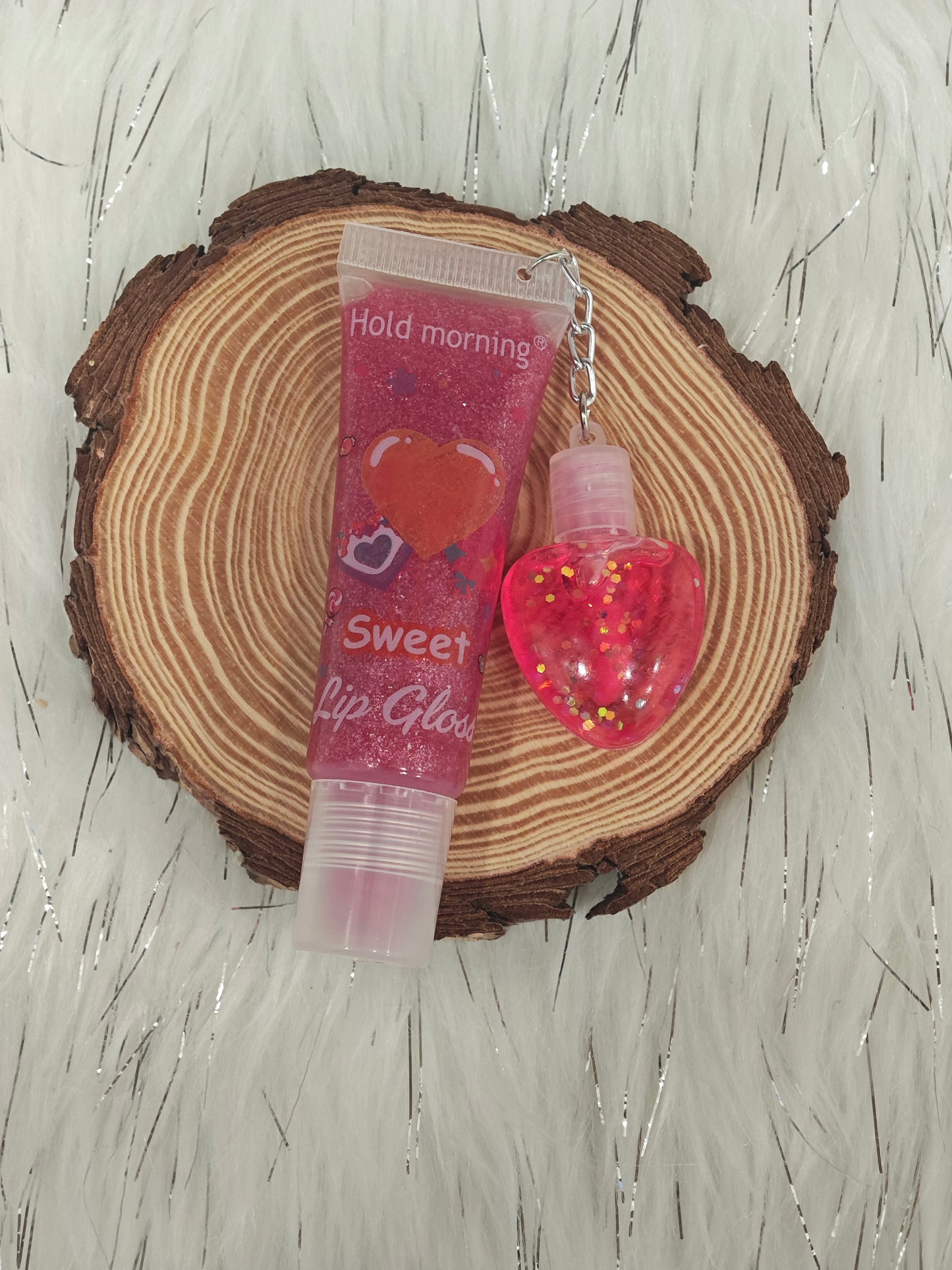 1 Lip Gloss Llavero de corazón 💫| ¡Tu brillo favorito siempre contigo!